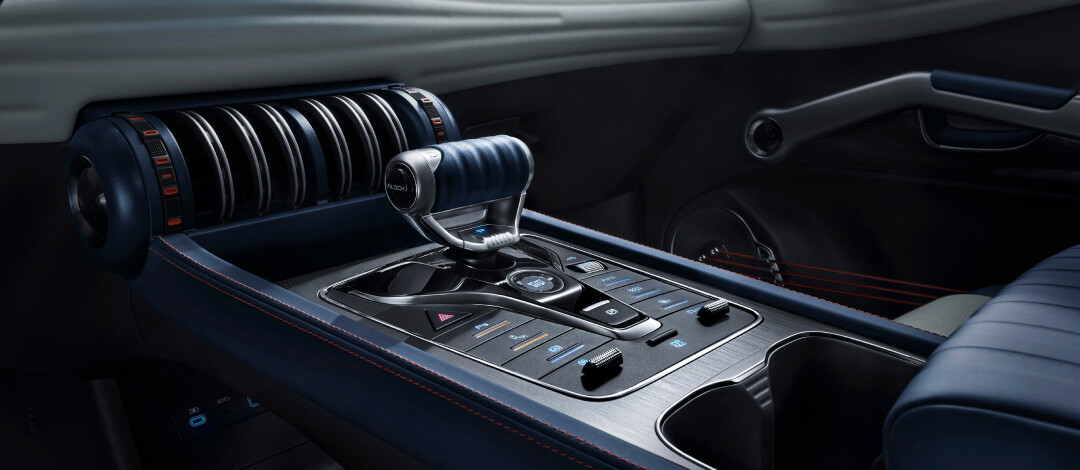 Treadmill style central armrest